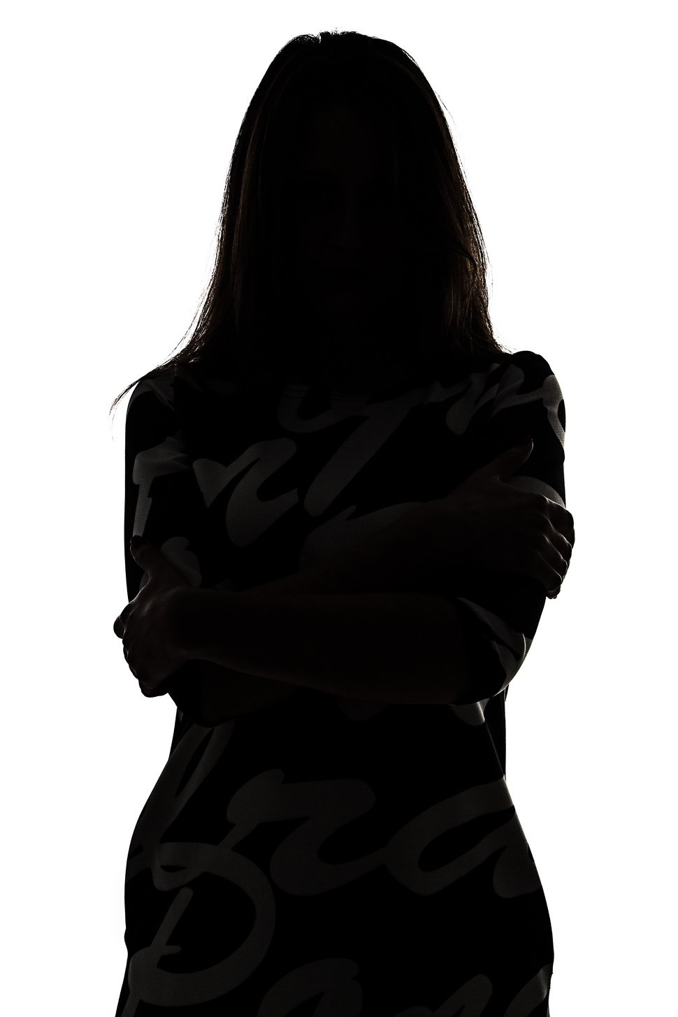 Silhouette of a woman in shadow